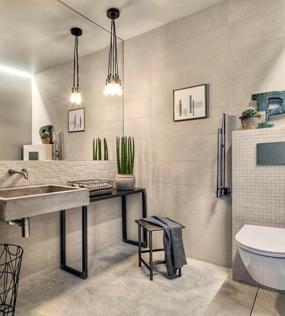 Wielkoformatowy gres Marazzi Chalk efekt beton w eleganckiej strefie dziennej